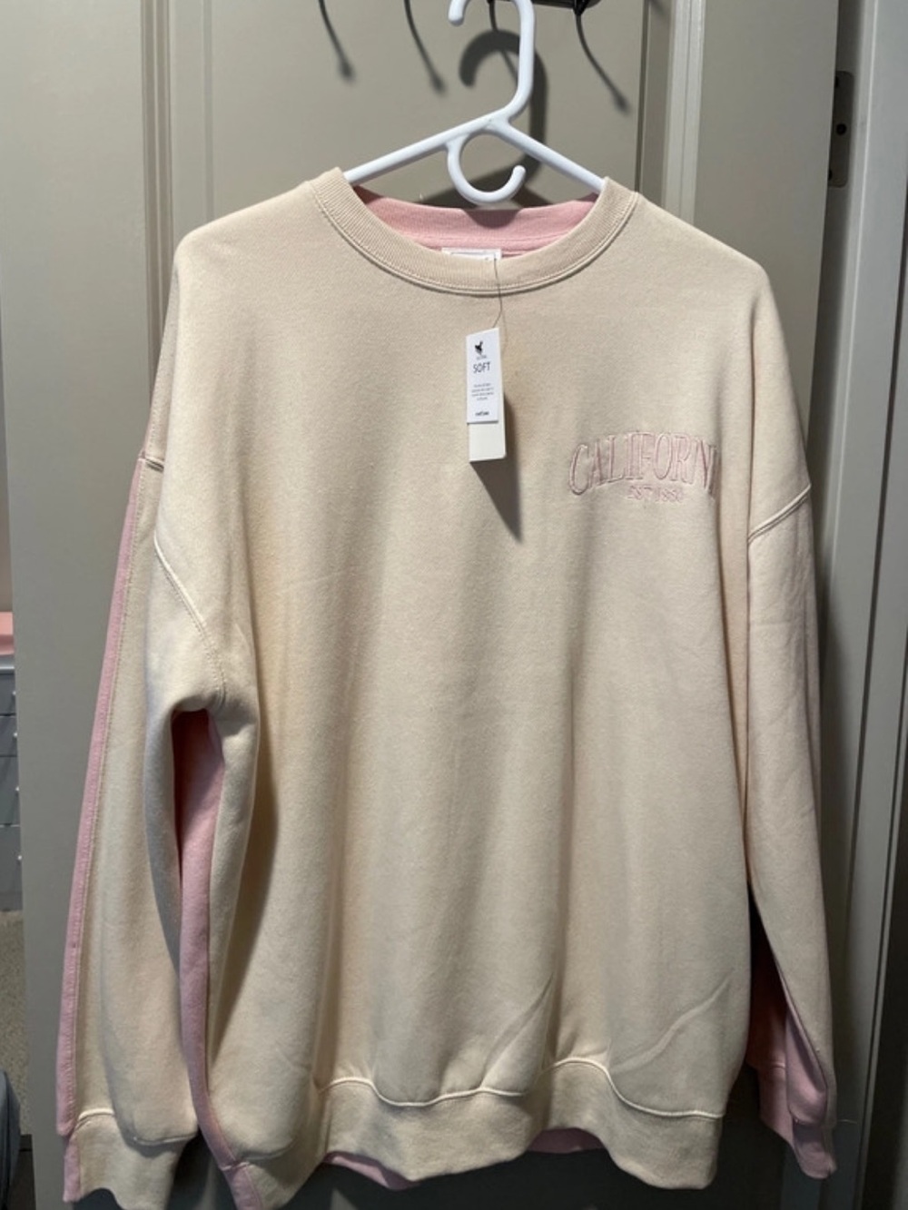 Reflex Cream Crewneck Sweatshirt with Pink Accents
